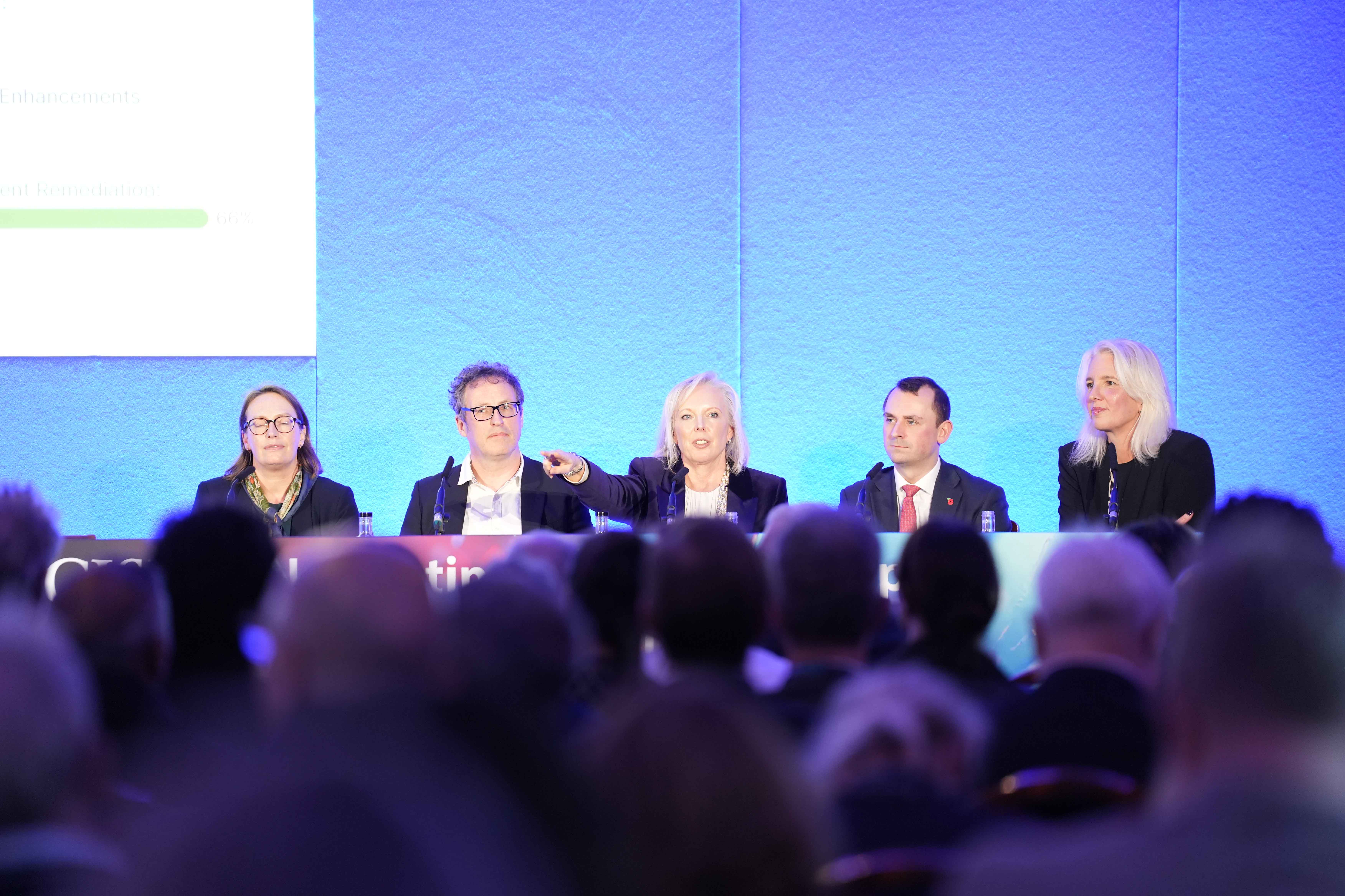 Audience engaged in ethical debate at the event
